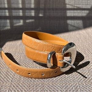 A Taylor caramel brown croc printed women’s Leather Belt Size L w/ silver Buckle